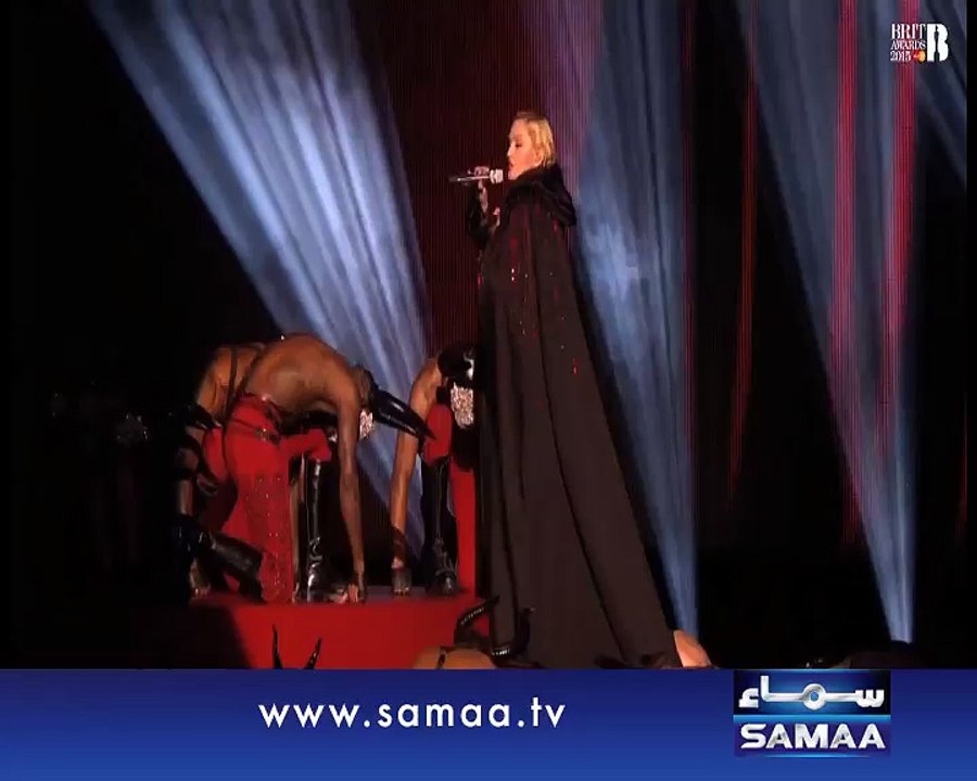 Madonna falls off stage