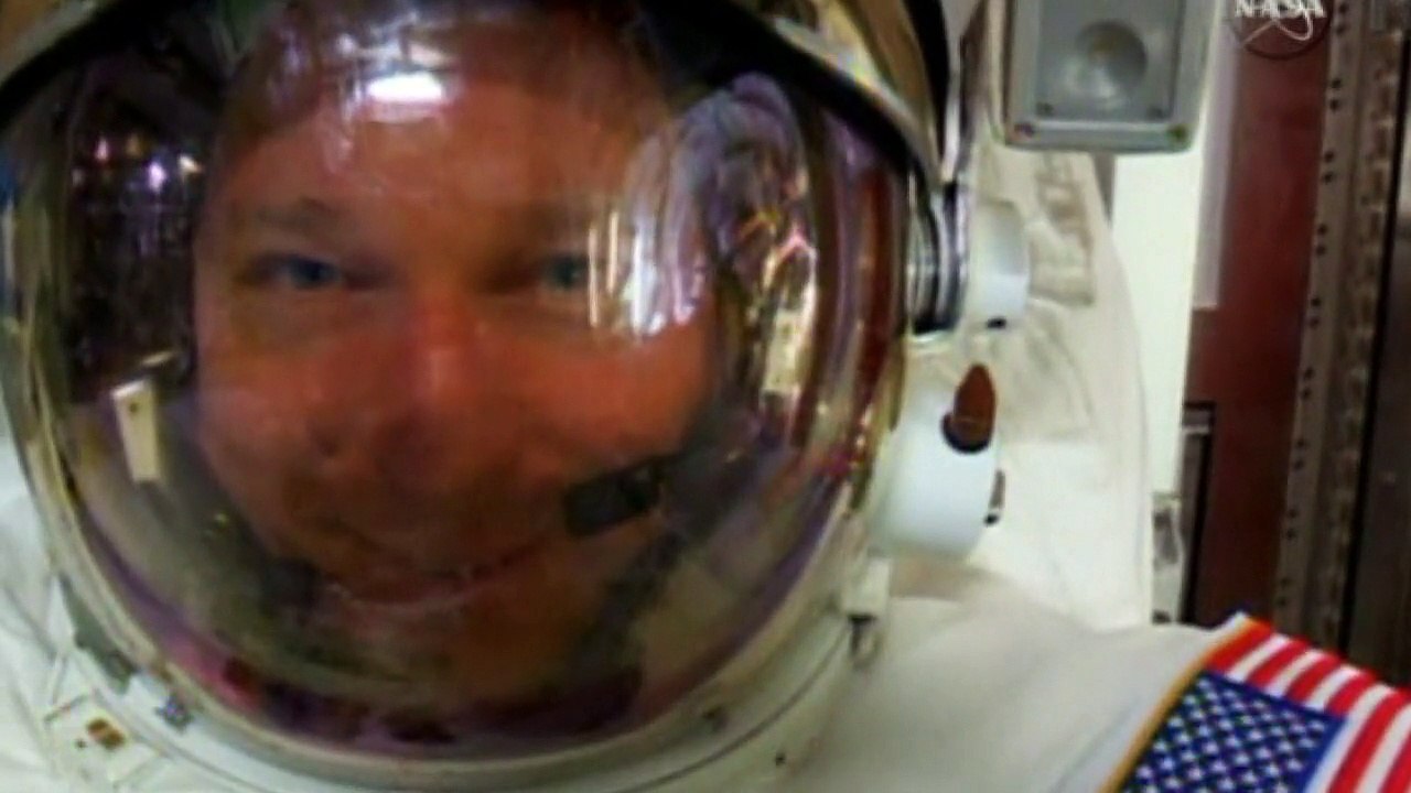 Astronaut finds water pooling in helmet during spacewalk