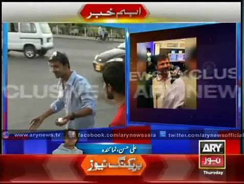 Egg-toting youngsters await Moin Khan on airport