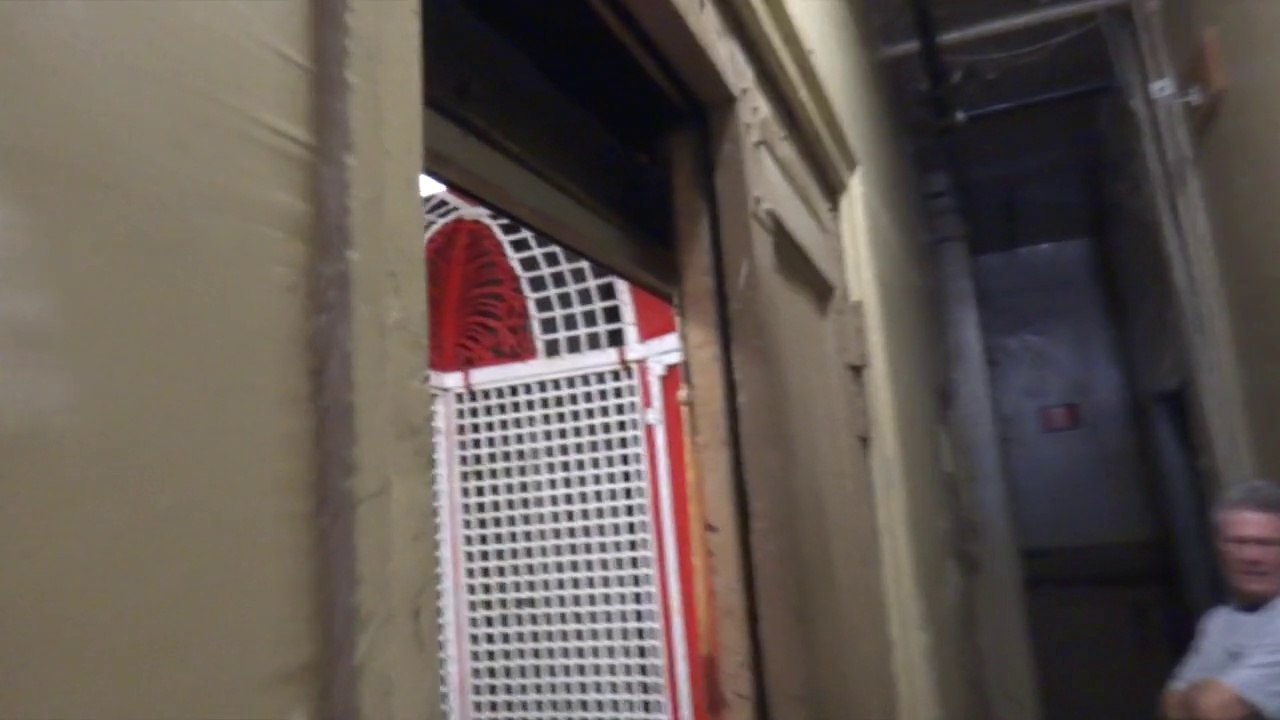 Vintage Red Bird cage elevator in NYC