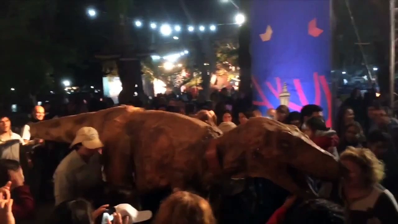 Dinosaur Invades Fiesta Nacional Del Sol.