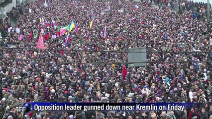 Tens of thousands march for slain Russian opposition leader