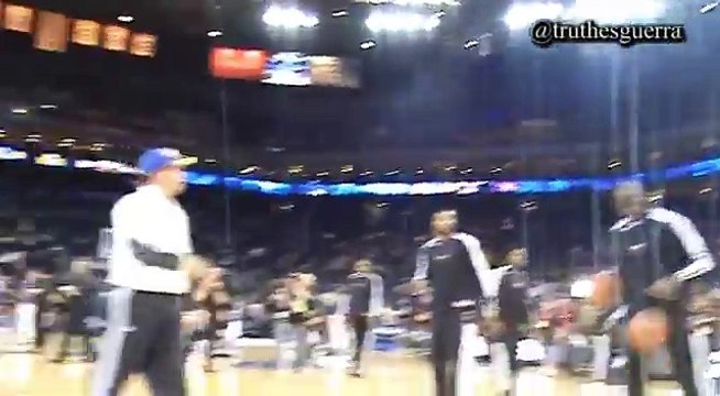 Fan assists LeBron during Warmups