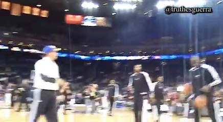 Fan assists LeBron during Warmups