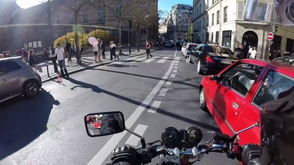 Inattentive Pedestrian Scared by a Motorcycle in Paris