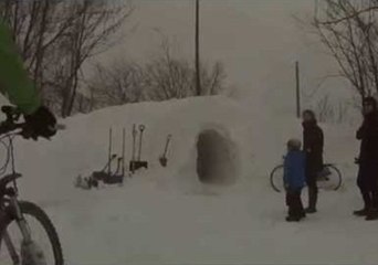 Biking Through a Man-Made Snow Tunnel