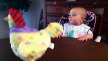 Baby's shocked reaction to an Easter hen laying eggs - 