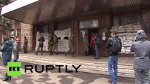 Relatives await news after massive gas blast at Donetsk mine in E.Ukraine