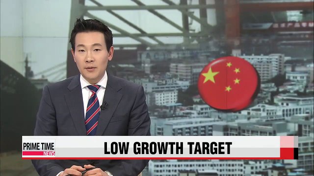 China lowers growth target, increases military budget