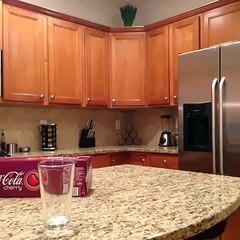 Soda can pours a drink for itself