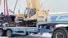 Big excavator transporting