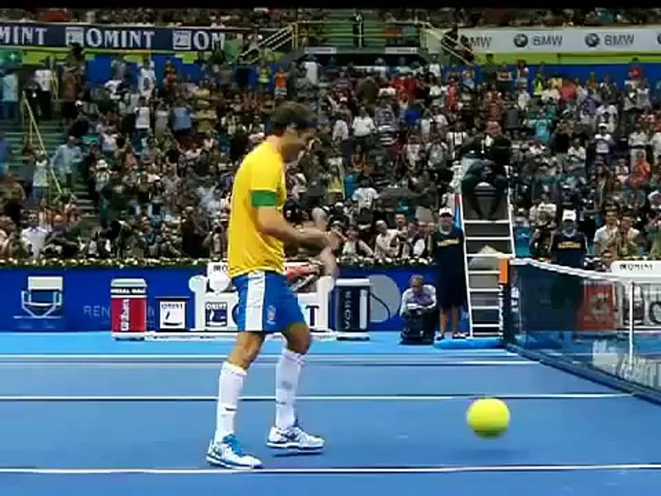 Roger Federer wearing the uniform of Brasil and playing football with Tommy Haas - Sao Paulo