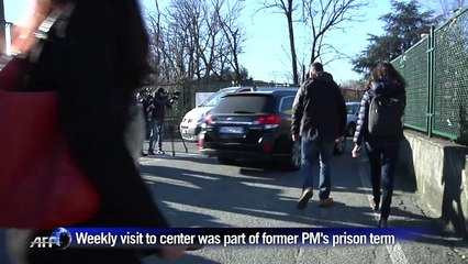 Berlusconi pays final visit to centre as community service ends