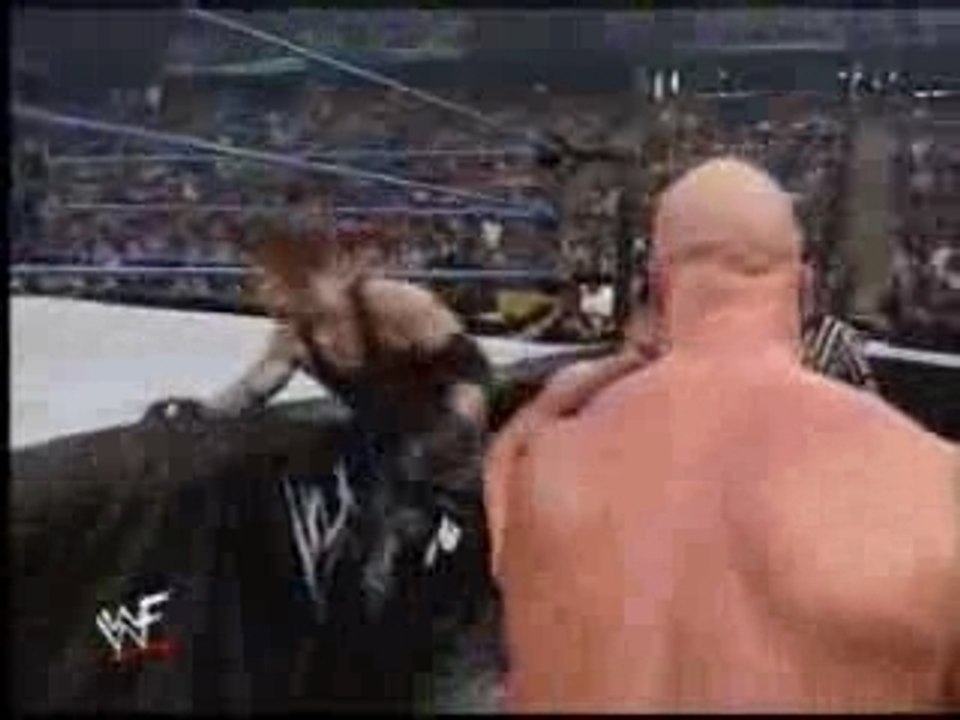 undertaker vs stone cold & kurt angle
