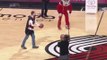 Portland Trail Blazers fans drains a half-court shot to win a FREE car!