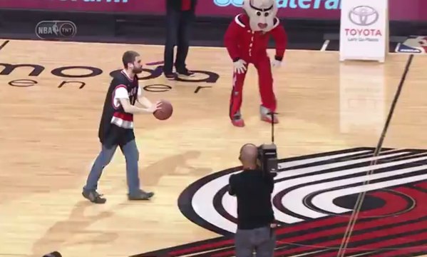 Portland Trail Blazers fans drains a half-court shot to win a FREE car!