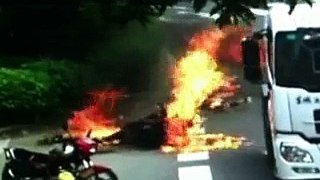 Dramatic CCTV- Chinese motorcyclist set on fire after lorry