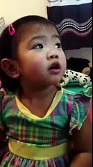 Cute little girl singing happy birthday song