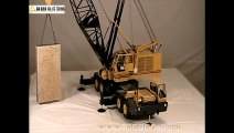 A 1-16 scale 150 ton Grove model crane lifting an 80 ton granite
