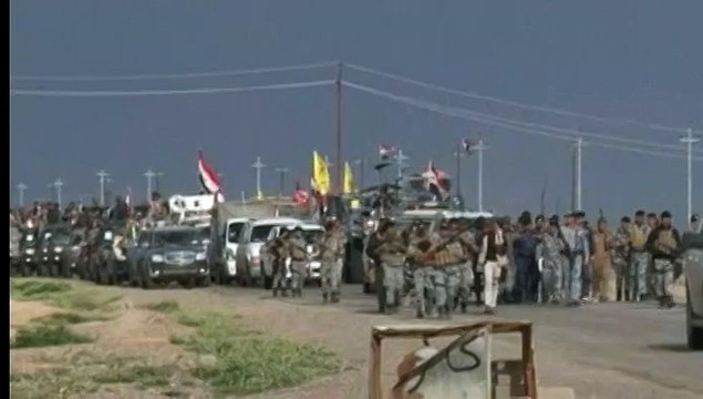 L'armée irakienne et les miliciens chiites entrent à Al Alam, un faubourg de Tikrit