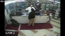 Store clerk disarms gun-wielding thug, chases him out of the store.