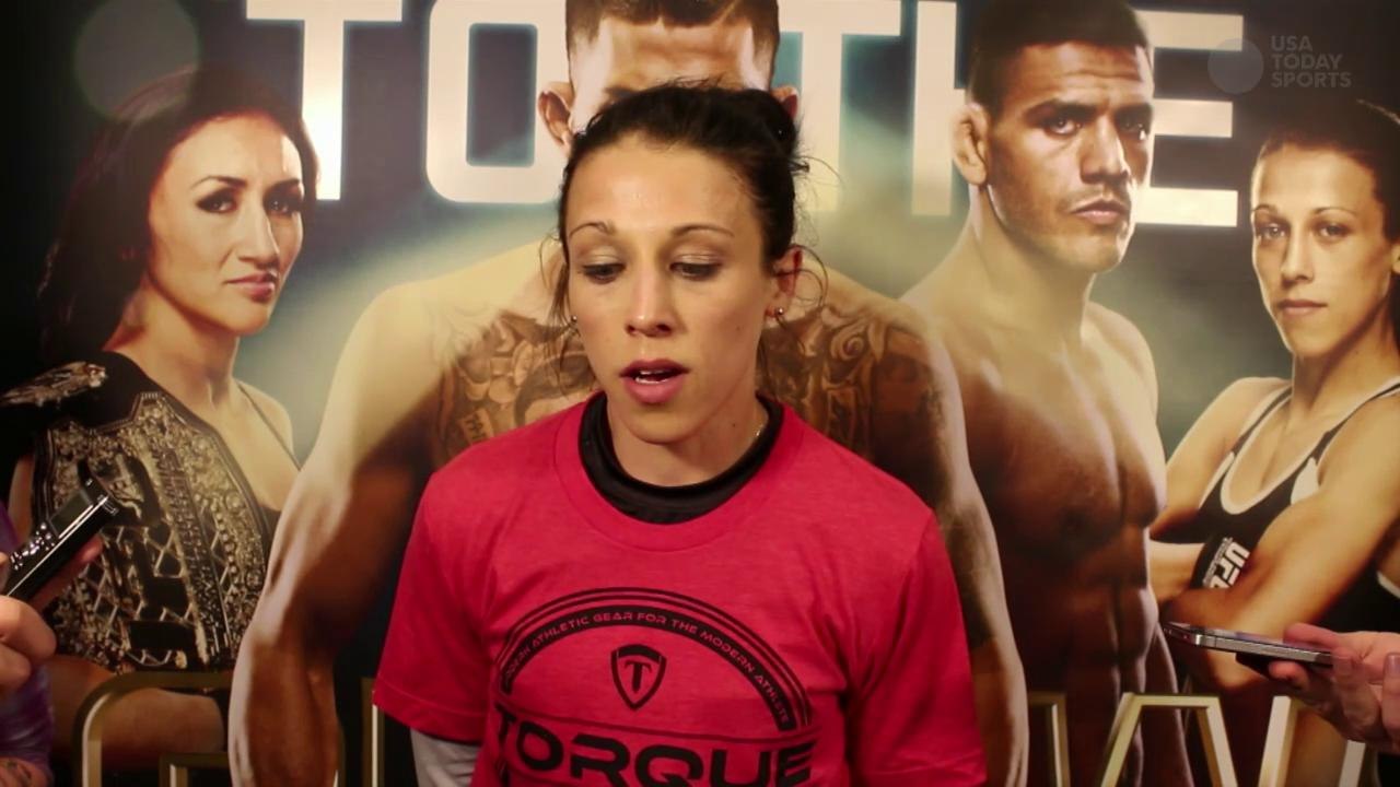 Joanna Jedrzejczyk talks to reporters after UFC 185 workout