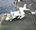 Multiple planes land and take off a Great Air Force Ship