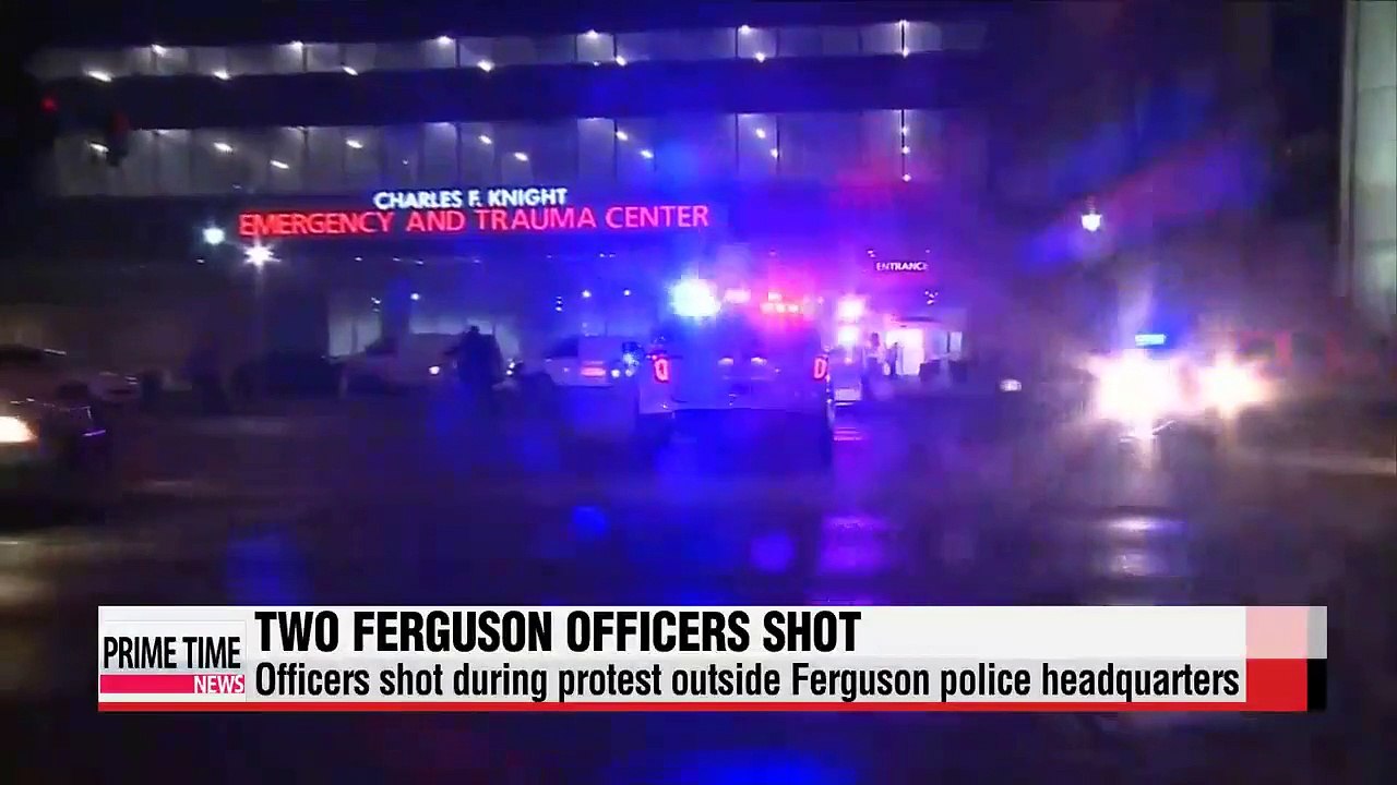 Two officers shot in Ferguson during protest
