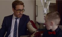 Robert Downey Jr. presents a real bionic Iron Man arm to a special kid