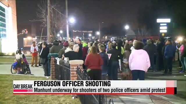 Two officers shot in Ferguson during protest