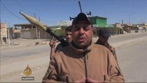 Iraqi forces tighten siege of Tikrit