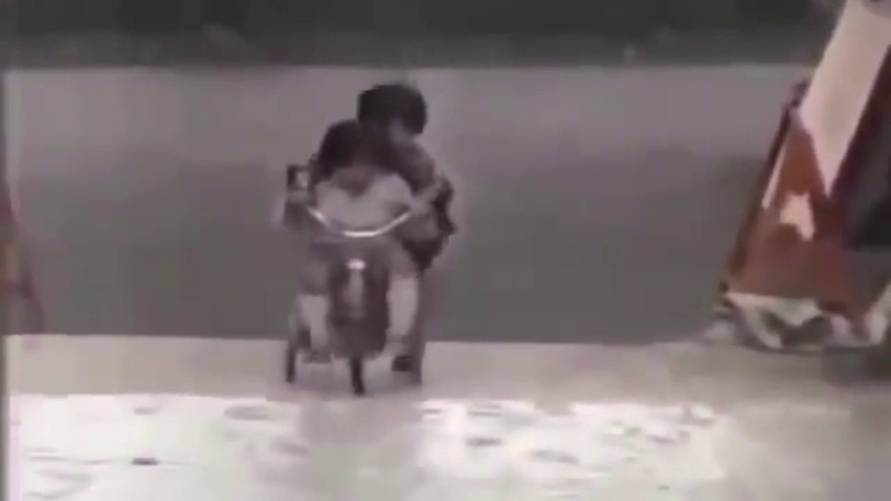 Little Boys riding trike are stuck on the sticky street prank