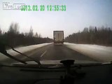 Driver loses control and hits a truck, which saves his life...
