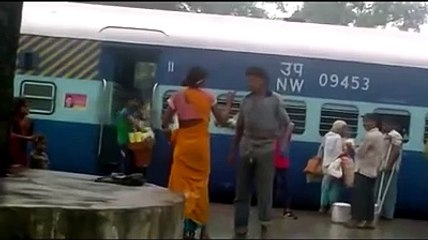 Woman wrestling in India at Railway station