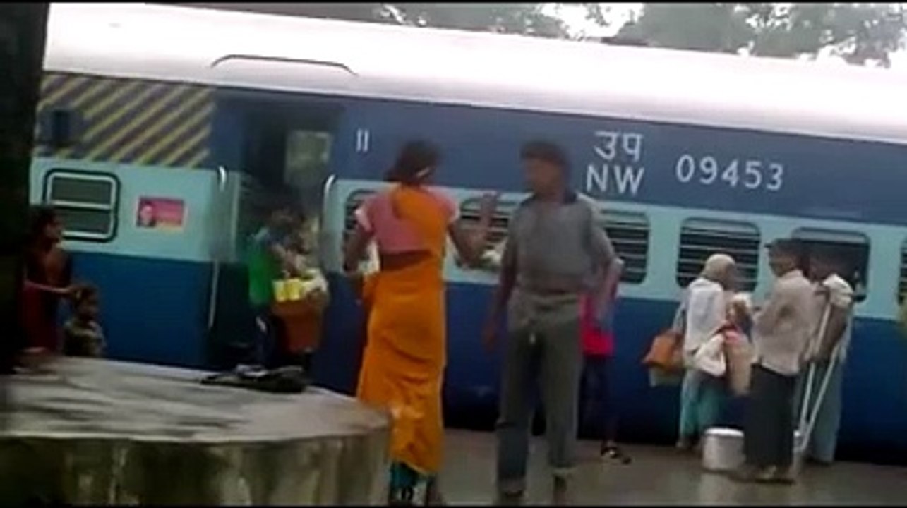 Woman wrestling in India at Railway station