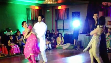Girls and boys dance in mehndi