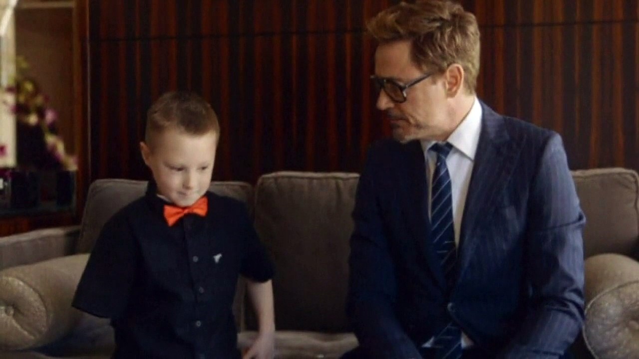 Robert Downey Jr gives boy 'Iron Man' arm