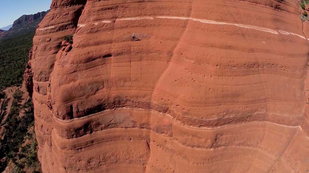 Crazy biker Riding the White Line : scary cliff!