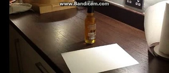 شاهد كيف تفتح زجاجة مشروب غازى بورقة