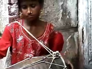 Indian Girl Sings and Plays Drum With Great Heart