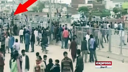 Exclusive Footage of the Car Racing over the protestors in Lahore