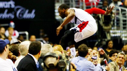 John Wall Dives into the Stands to Recover Loose Ball