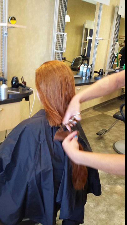 haircut on long red hair to a new style