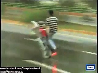 Naked one wheeling in Pakistan - Boy arrested