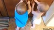 Twin Cute Baby Playing With Rubber Band