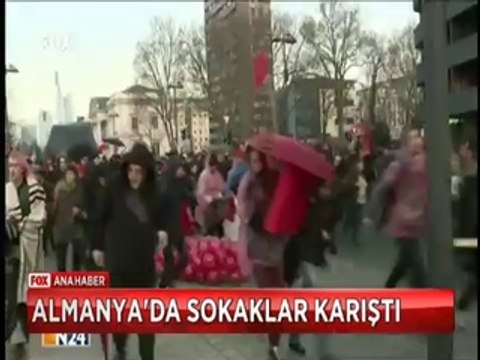 Almanya'da sokaklar karıştı göstericiler polis araçlarını yaktılar