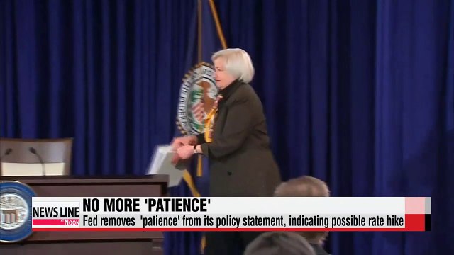 Fed opens door for rate hike but slashes growth, inflation outlook