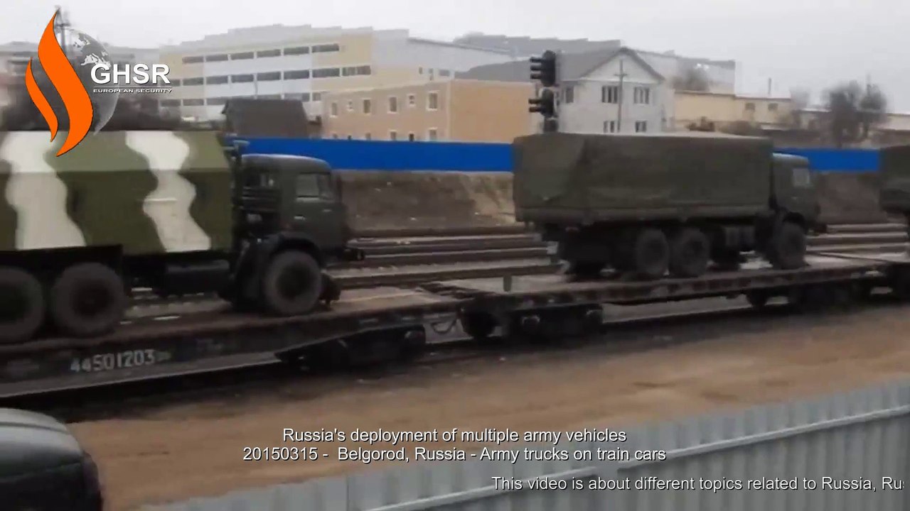 20150315 -  Belgorod, Russia - Army trucks on train cars