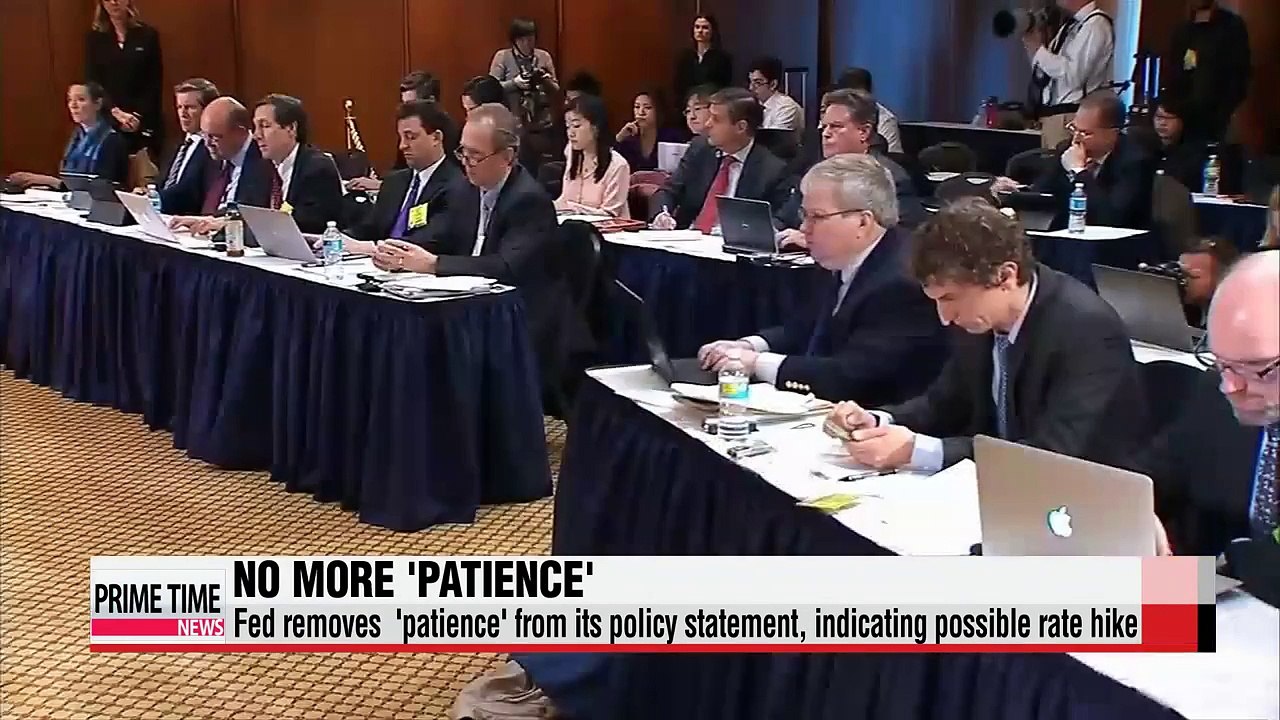 U.S. Fed opens door for rate hike but slashes growth, inflation outlook