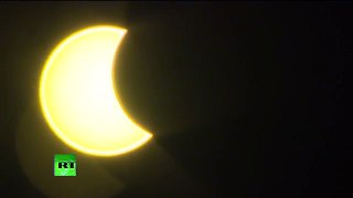 Solar Eclipse 2015 (as seen from UK, Switzerland, Norway, Russia) - YouTube